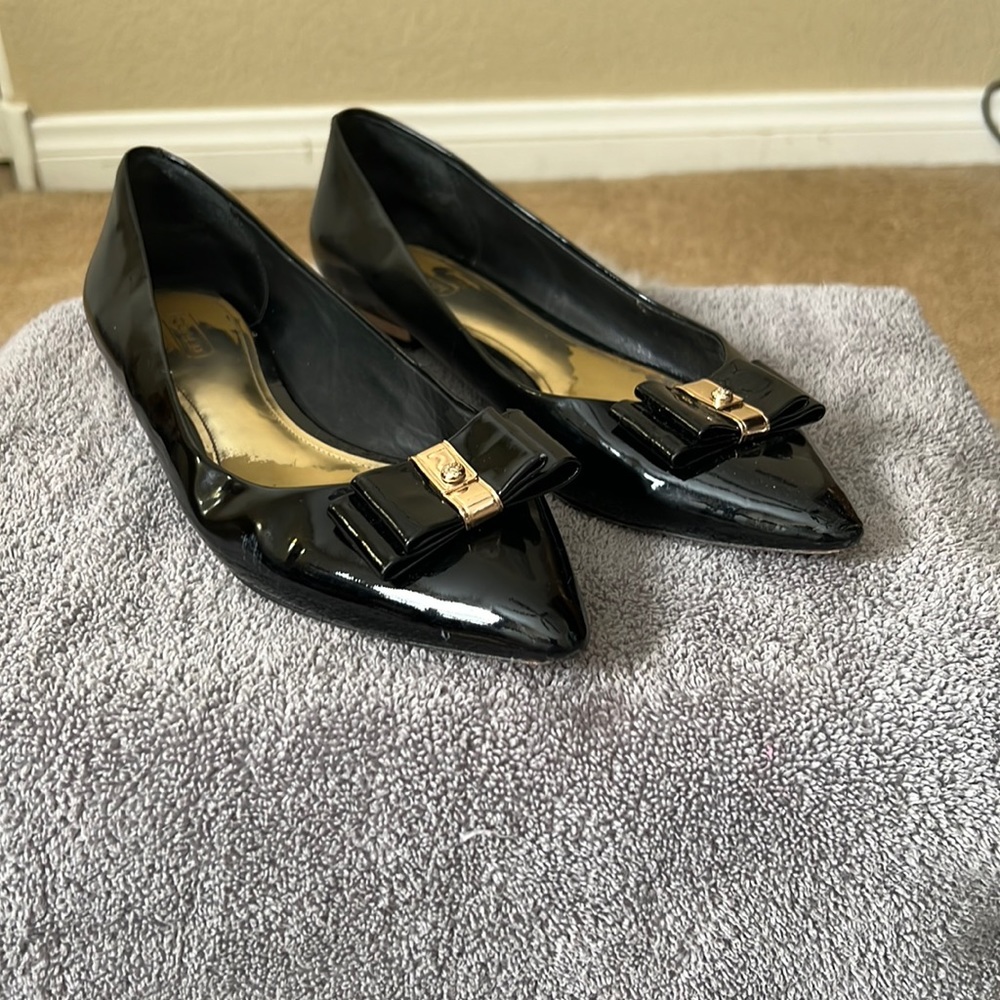 Black coaches with a bow